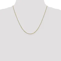 A thin gold-toned chain necklace displayed on a mannequin bust against a white background.
