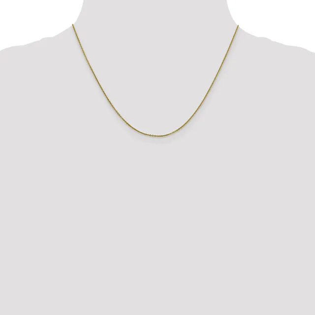 A thin gold-toned chain necklace displayed on a mannequin bust against a white background.