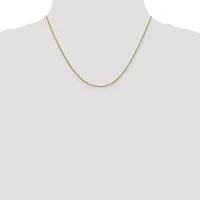 A thin gold-toned chain necklace displayed on a mannequin bust against a white background.