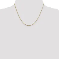 A thin gold-toned chain necklace displayed on a mannequin neck form against a white background.