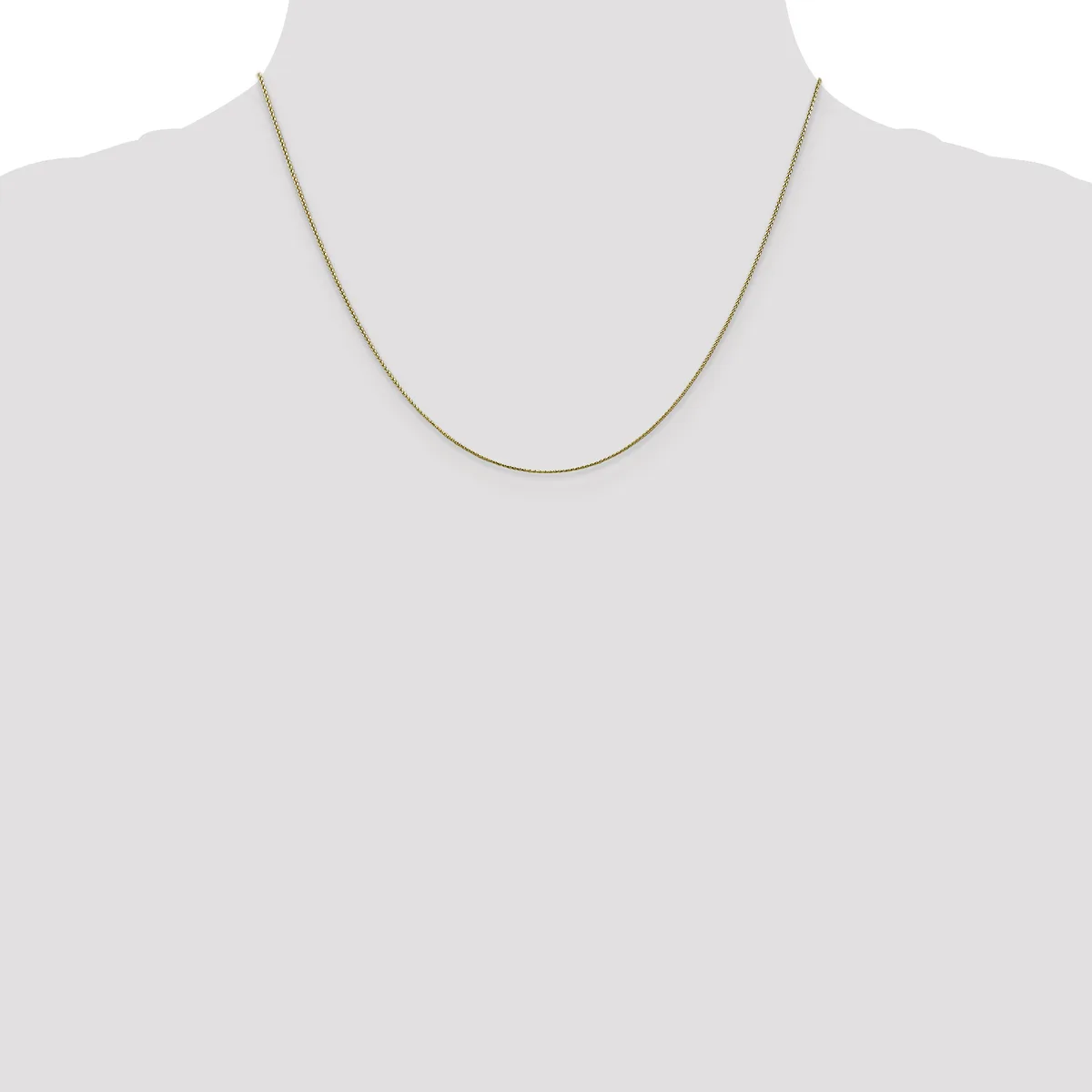 A thin gold-toned snake chain necklace displayed on a mannequin bust against a white background.