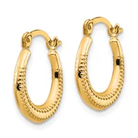 A pair of polished gold hoop earrings with textured beaded detailing along the lower portion and hinged closures at the top.