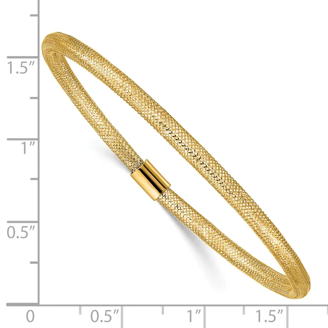 Gold-toned mesh bangle bracelet with a cylindrical magnetic clasp, shown against a ruler measuring approximately 1.5 inches in height.