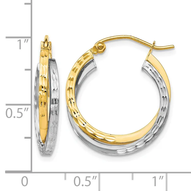 Two-tone gold hoop earrings with textured and polished surfaces, shown next to a measurement scale indicating approximately one inch in diameter.
