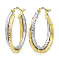 A pair of two-tone gold hoop earrings with hammered texture, featuring white and yellow gold twisted together, displayed against a white background.
