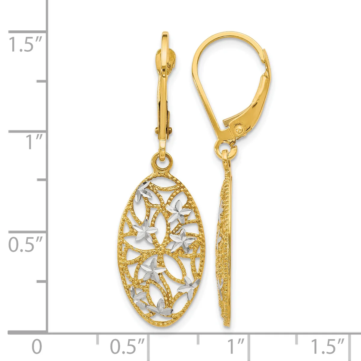 Pair of gold-tone leverback earrings with oval filigree pendants featuring white enamel leaf designs, shown against a measurement scale.