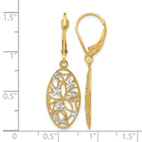 Pair of gold-tone leverback earrings with oval filigree pendants featuring white enamel leaf designs, shown against a measurement scale.