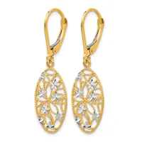 Pair of gold and white two-tone filigree oval dangle earrings with lever-back closures.