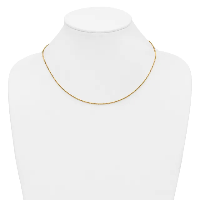 A delicate gold-toned chain necklace displayed on a white mannequin bust.