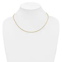 A delicate gold-toned chain necklace displayed on a white mannequin bust.