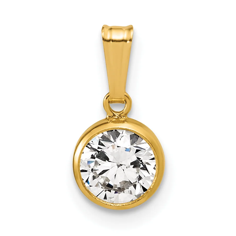 A gold pendant with a round bezel setting holding a clear faceted cubic zirconia or diamond simulant, suspended from a rectangular bail.