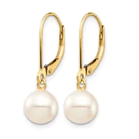 A pair of gold lever-back earrings with round white pearl drops suspended from small connector loops.
