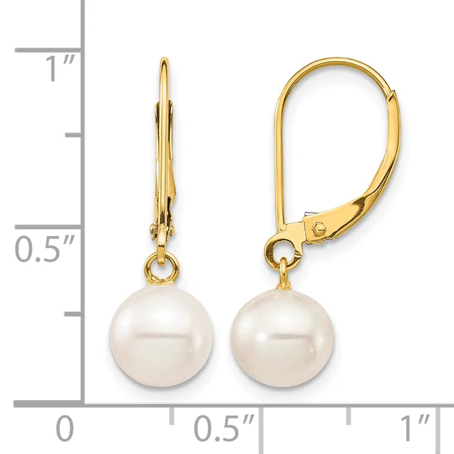 Pair of gold leverback earrings with white pearl drops, displayed next to a measurement scale showing approximately one inch in length.