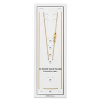 A display card showing four gold-filled chain necklaces in various lengths from 15 to 30 inches, each suspended from hooks against a white background.