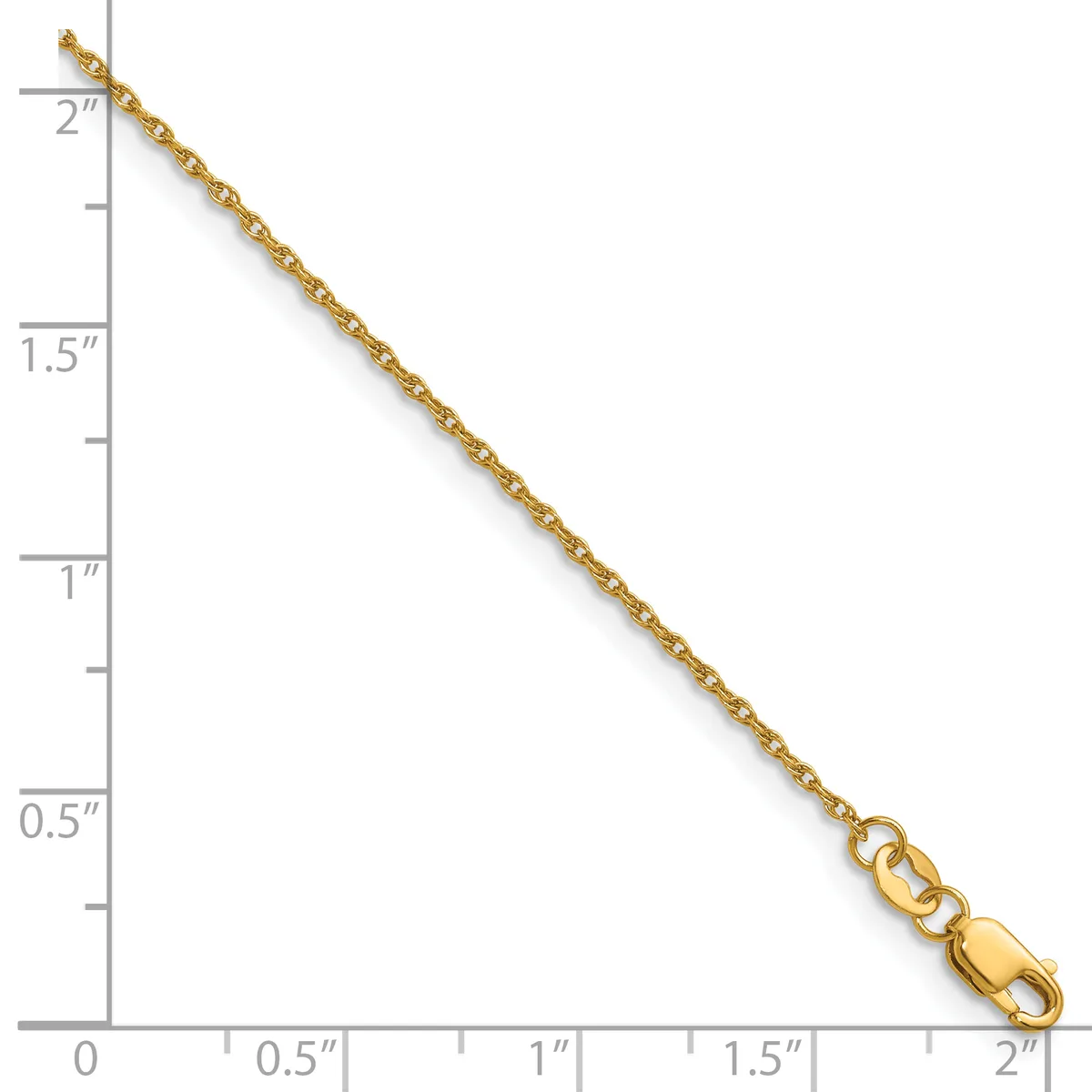 A gold chain necklace displayed against a ruler showing its length of approximately two inches.