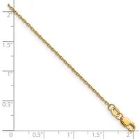 A gold chain necklace displayed against a ruler showing its length of approximately two inches.
