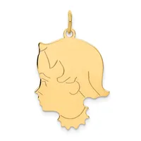 Gold pendant in the shape of a child's profile with hair details and a small loop attachment at the top.