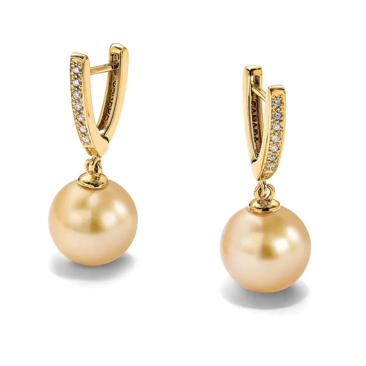 Pair of gold drop earrings with diamond-set leverback hooks and round golden pearl pendants.