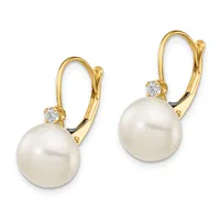 A pair of gold lever-back earrings, each featuring a white pearl suspended below a small round diamond, displayed against a white background.
