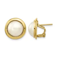 Pair of gold-toned round earrings with white pearl centers and omega clip backs, shown from front and side views.