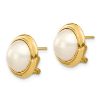 A pair of gold-toned stud earrings with oval white pearl centers set in polished yellow gold bezels with small decorative scrolls at the base.