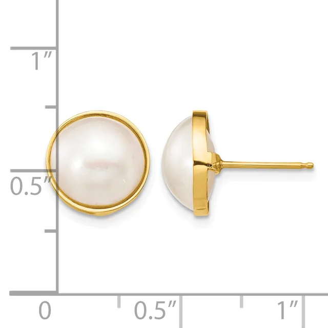 Pair of round white pearl stud earrings set in gold-tone metal, shown from front and side views next to a measurement scale.