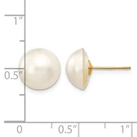 A pair of white pearl stud earrings shown from front and side views next to a measurement scale indicating approximately half-inch diameter pearls with gold posts and backs.