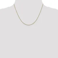 A thin gold-toned chain necklace displayed on a mannequin bust against a white background.