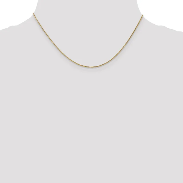 A thin gold-toned chain necklace displayed on a mannequin neck against a white background.
