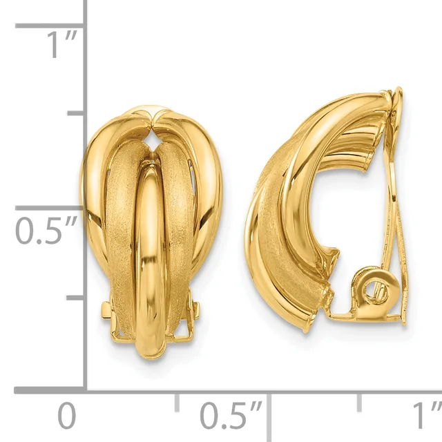 Two gold-tone curved clip-on earrings shown from front and back views, displayed against a measurement scale indicating approximately one inch in height.