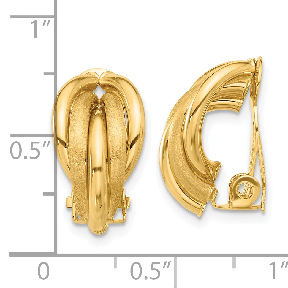Two gold-tone curved clip-on earrings shown from front and back views, displayed against a measurement scale indicating approximately one inch in height.