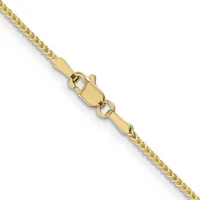 A gold chain necklace with a lobster clasp, shown diagonally against a white background.