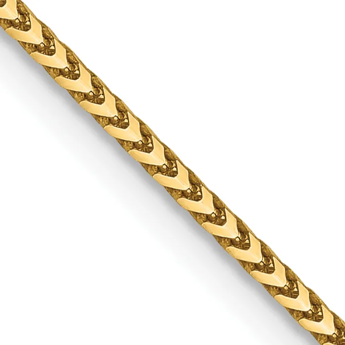 A gold-colored chain with a textured diamond or chevron pattern running diagonally across a white background.