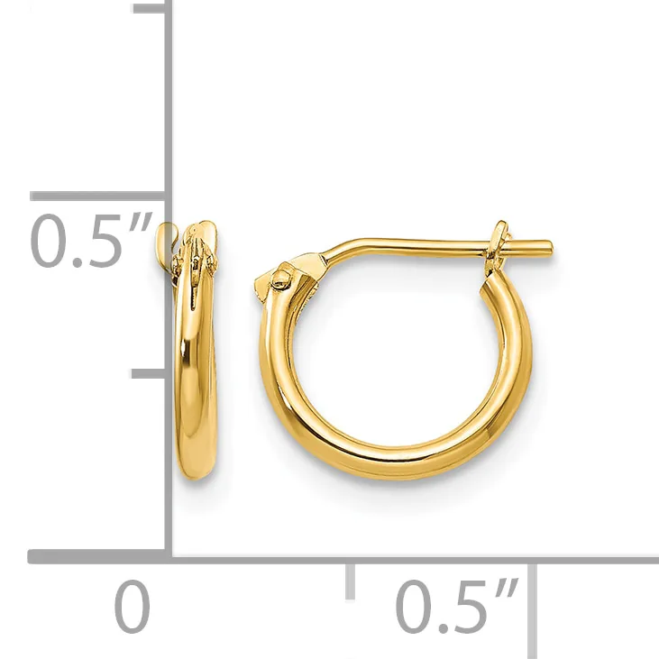 A pair of polished gold-toned hoop earrings with a post and clutch back, displayed next to a measurement scale showing 0.5 inches in height and width.