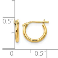 A pair of polished gold-toned hoop earrings with a post and clutch back, displayed next to a measurement scale showing 0.5 inches in height and width.