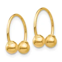 Two gold hoop earrings with polished spherical ball terminals, displayed side by side against a white background.