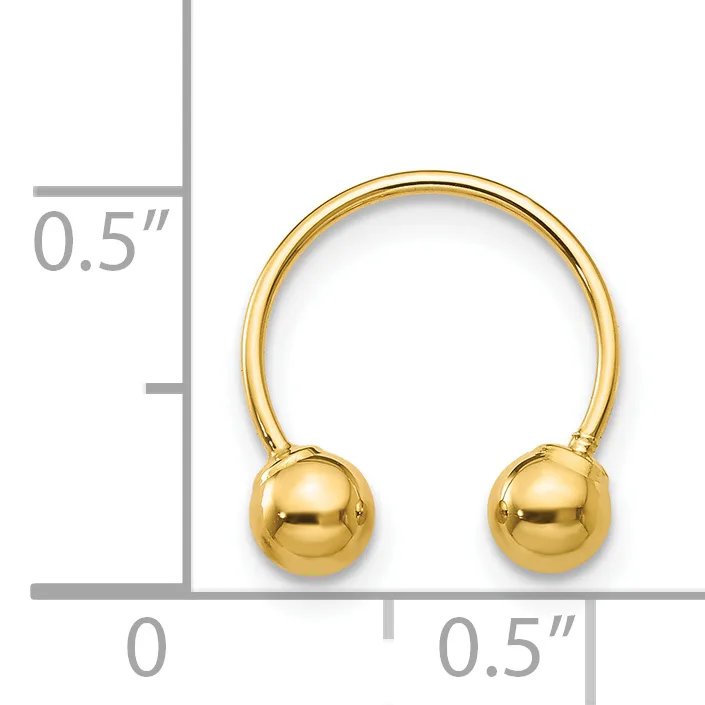 Gold-toned open bangle bracelet with spherical ball terminals on each end, shown next to a ruler indicating approximately 0.5 inches in width and height.