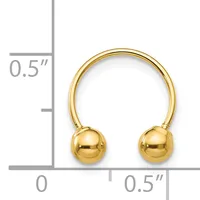 Gold-toned open bangle bracelet with spherical ball terminals on each end, shown next to a ruler indicating approximately 0.5 inches in width and height.
