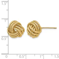 A pair of textured gold knot stud earrings with posts, displayed against a measurement scale showing approximately 0.75 inches in diameter.