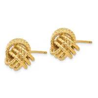 Pair of gold textured stud earrings shaped like seashells with posts and backs, displayed against a white background.