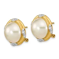 Pair of two-tone gold and silver stud earrings featuring oval cream pearls surrounded by diamond accents.