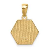 A gold hexagonal pendant with a textured surface and a small stamped hallmark, suspended from a polished gold bail.