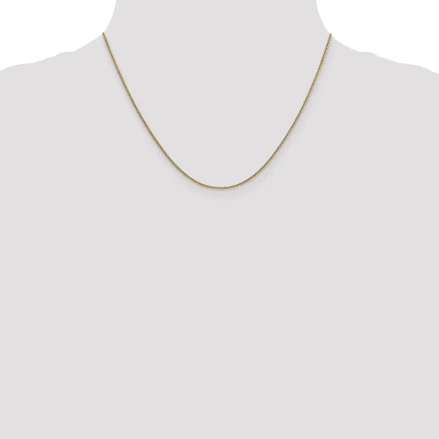 A thin gold-toned chain necklace displayed on a mannequin bust against a white background.