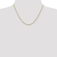 A delicate gold-toned chain necklace displayed on a mannequin bust against a white background.