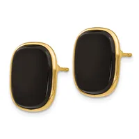 A pair of gold-toned stud earrings with polished black oval stone faces and small post backs.