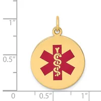 Gold medical alert pendant with a red star of life symbol and intertwined serpent staff, shown next to a ruler for scale.
