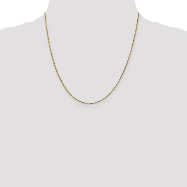 A thin gold-toned chain necklace displayed on a mannequin torso against a white background.