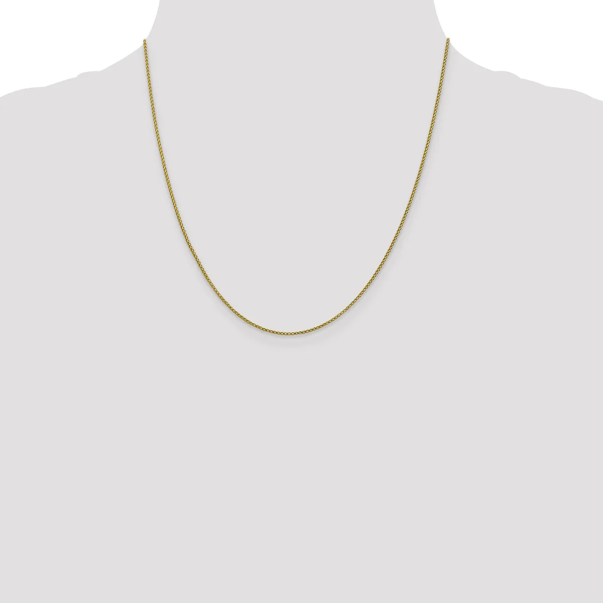 A thin gold-toned chain necklace displayed on a mannequin torso against a white background.