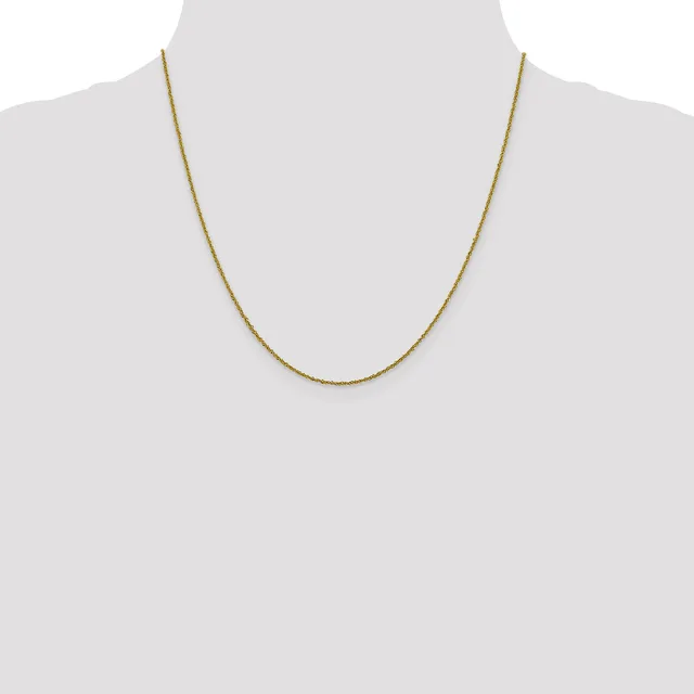 A thin gold-toned chain necklace displayed on a mannequin bust against a white background.
