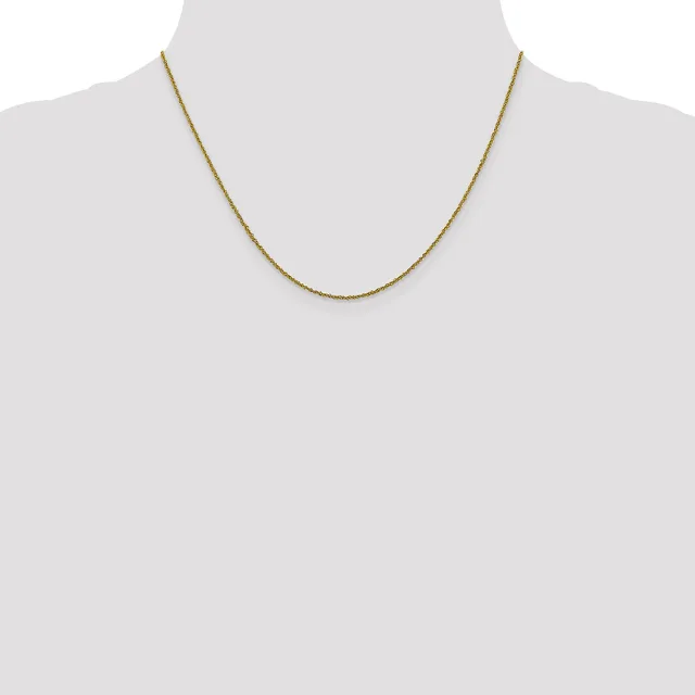 A thin gold-toned chain necklace displayed on a mannequin bust against a white background.